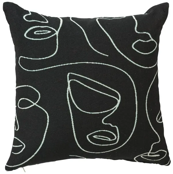 soffkudde svart med ansikten rusta